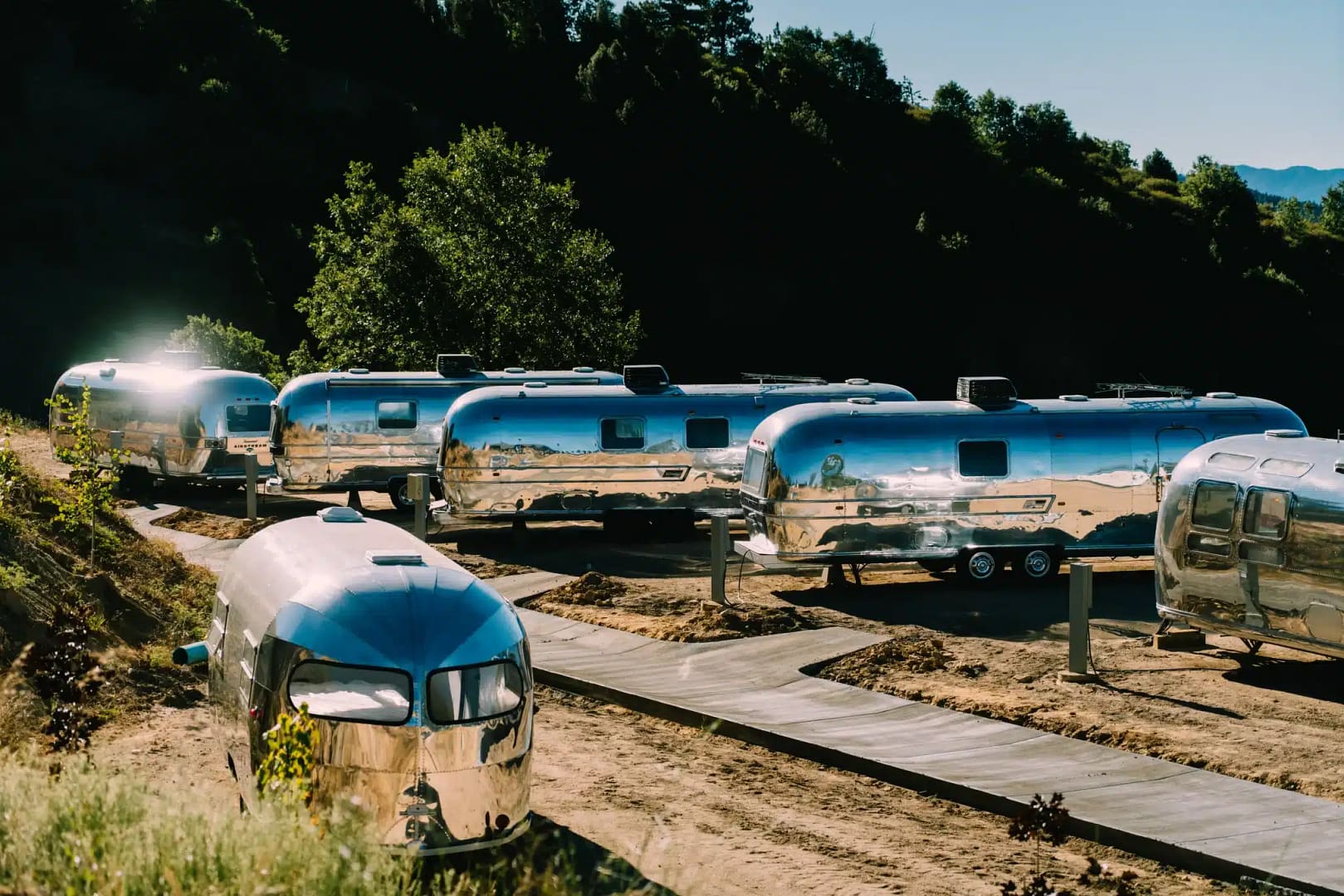 A group of airstream trailers parked at Skypark in Southern California.