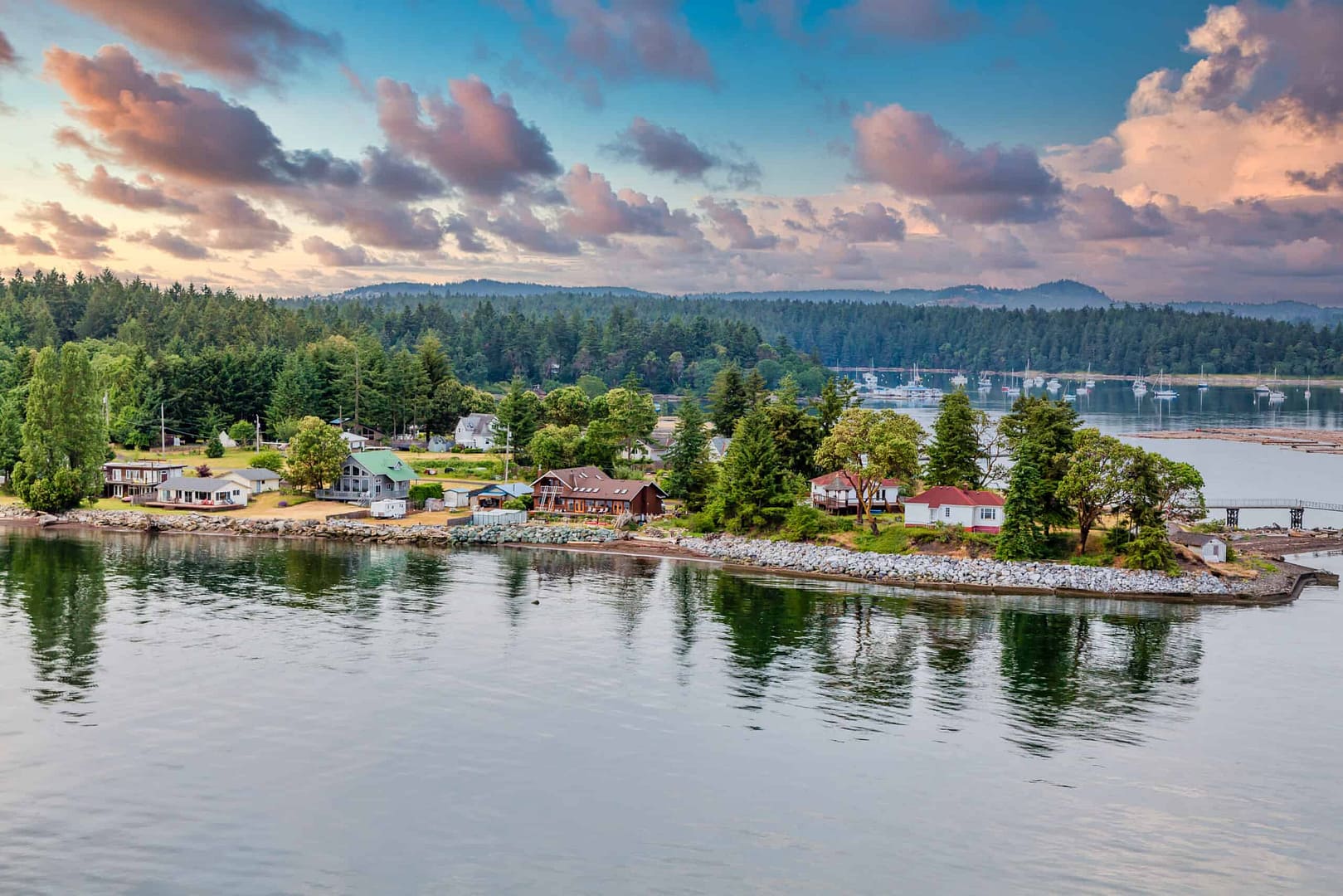 Aerial view of a small island in the Nanaimo Region surrounded by water and trees as part of a survey on Parks and Trails Development.