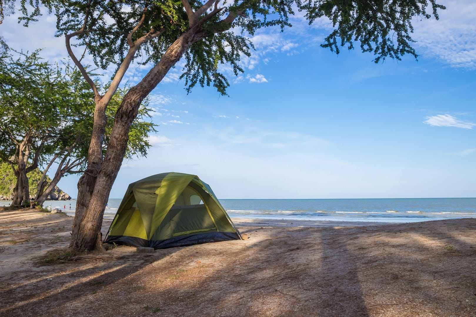 A tent set up on the Pearl Lake beach, signaling the grand reopening under new ownership.