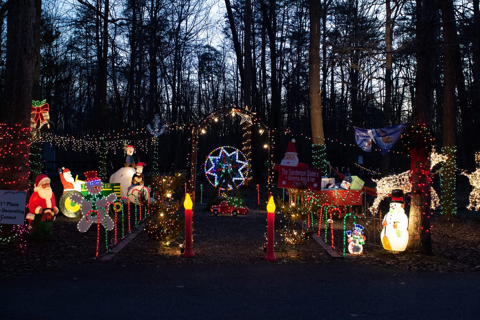 The Lights at the Lake Event transforms Bear Creek Lake State Park into a mesmerizing wonderland as it illuminates the wooded area with a breathtaking Christmas light display.