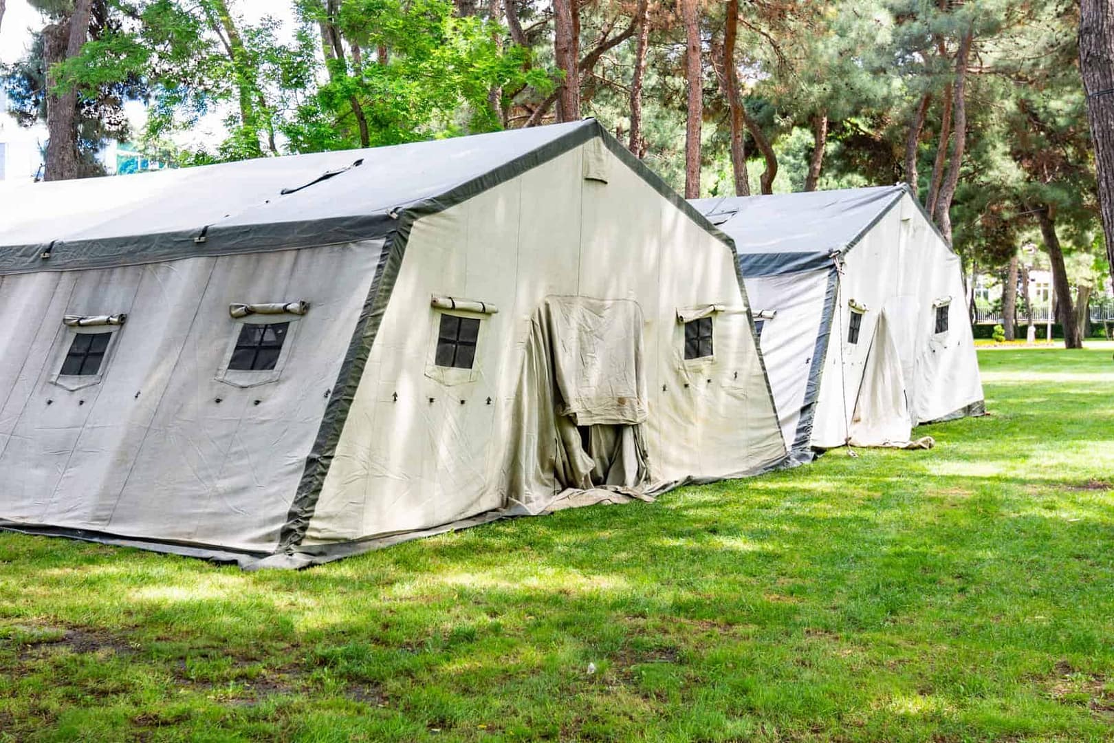 A line of tents at a UK glamping site.