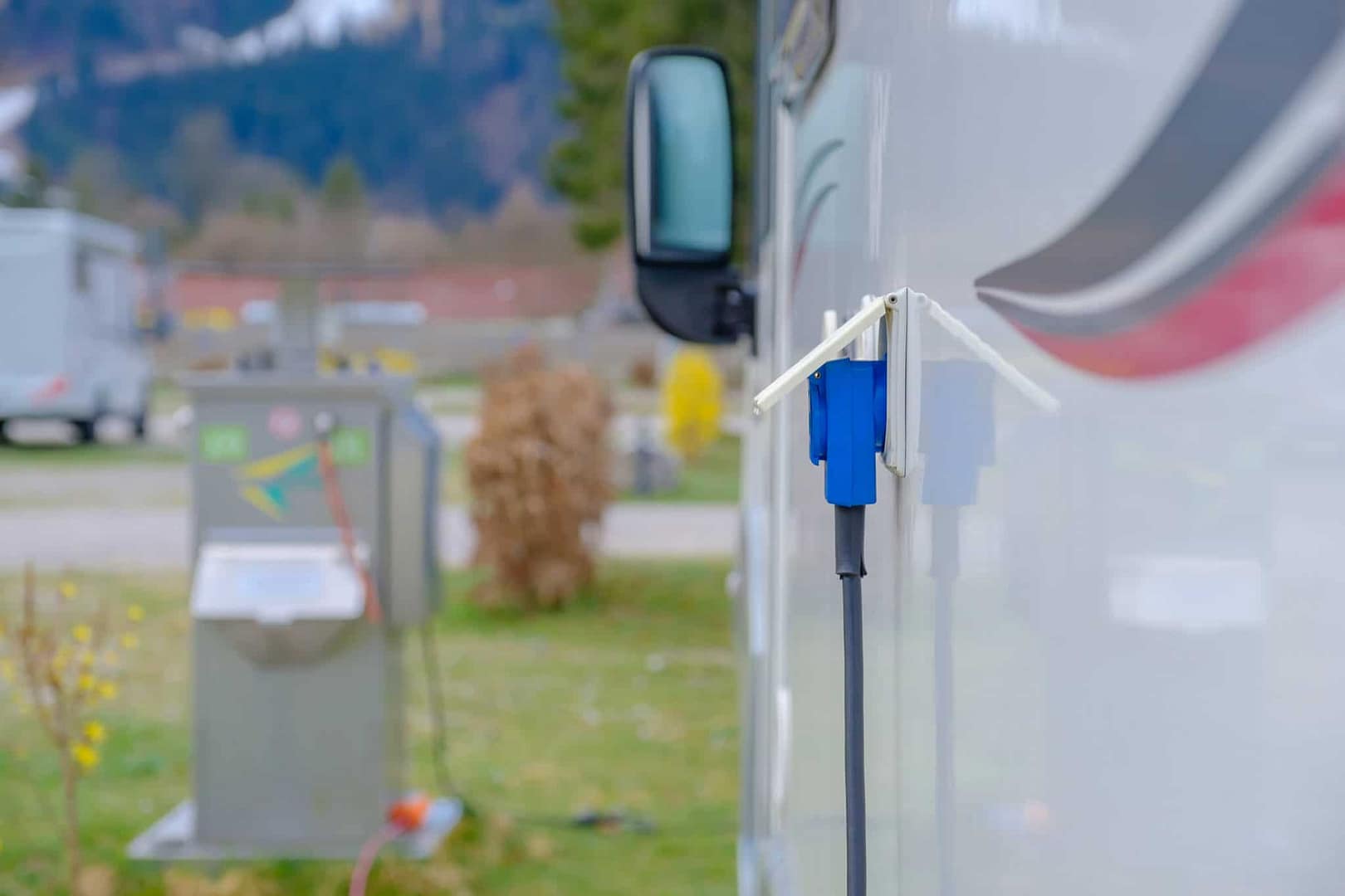 An RV connected to a power outlet at an Australian town's RV rest stop as part of a trial.