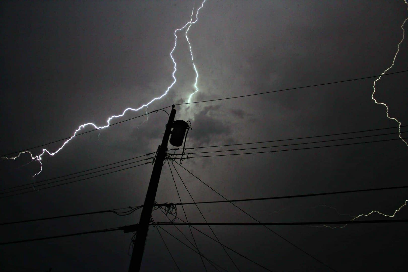 Lightning strikes over a power pole in Louisiana during Hurricane Ida.