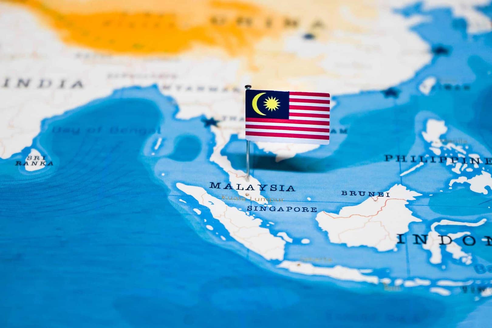 Malaysia flag on the map of Malaysia - a popular tourist attraction.
