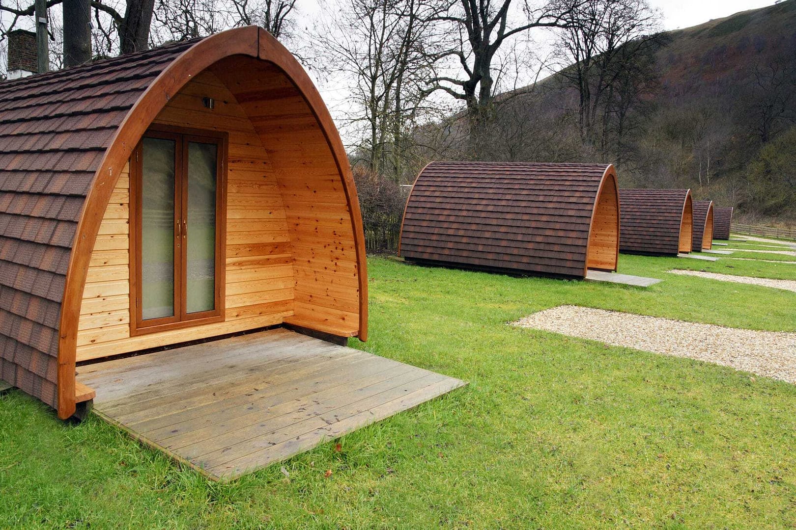 A proposal to build glamping pods in a grassy area.