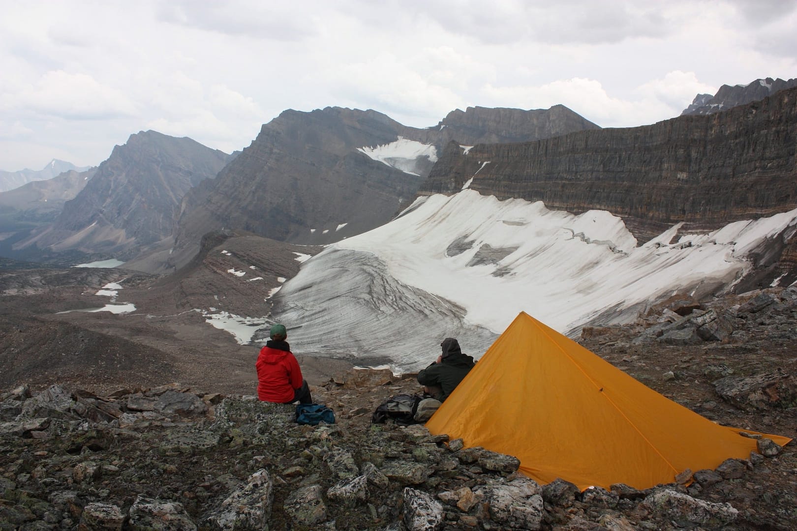 A camping reservation tent on top of a rocky mountain in Alberta Parks.