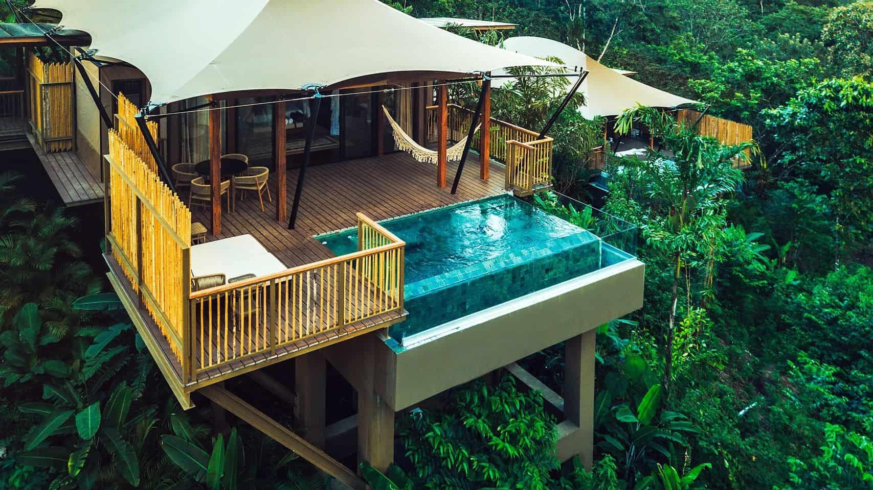 A famous glamping resort in Costa Rica offers a tree house in the jungle with a swimming pool.