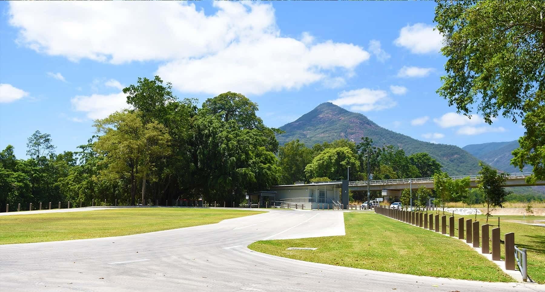 Greenpatch Campground reopens tomorrow with trees and mountains in the background.