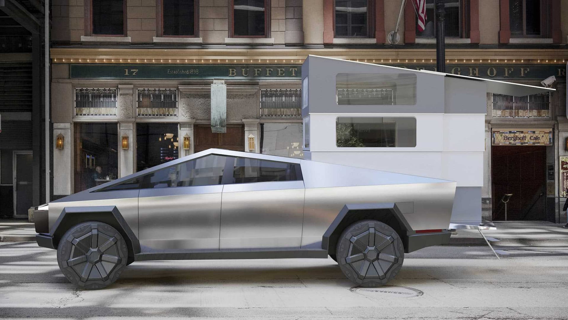 A silver CyberLandr vehicle is parked in front of a building.