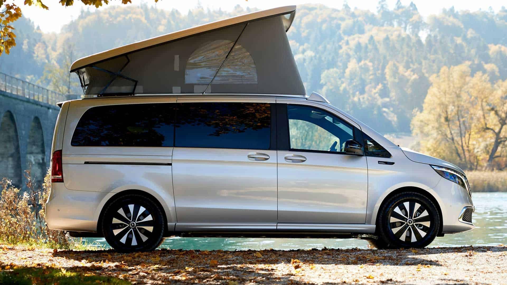 The 2019 Mercedes-Benz Vito, an All-Electric Motorhome, is parked next to a river.
