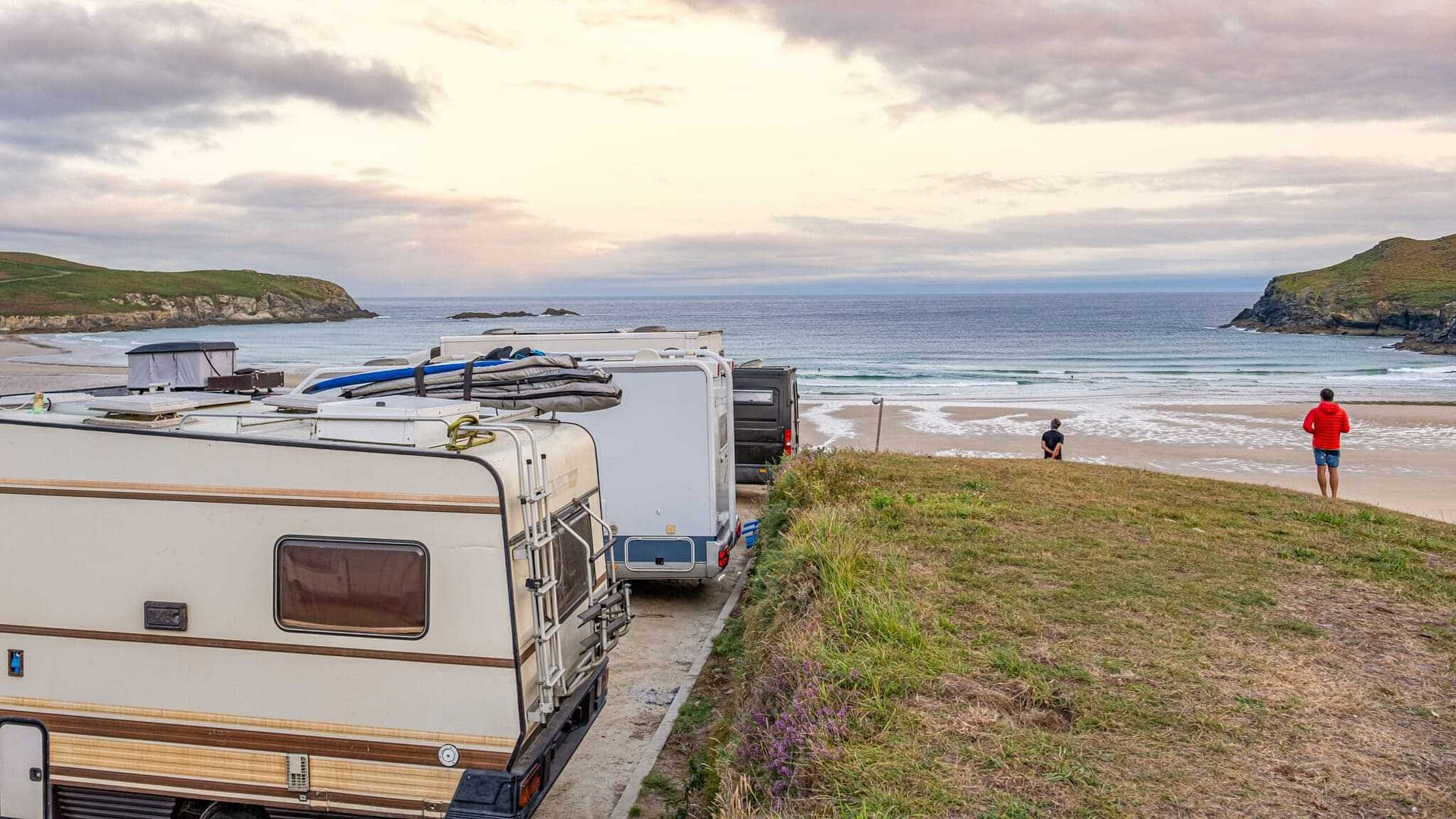 Renmark premium cabins parked on a beach near the ocean at Riverbend Caravan Park.