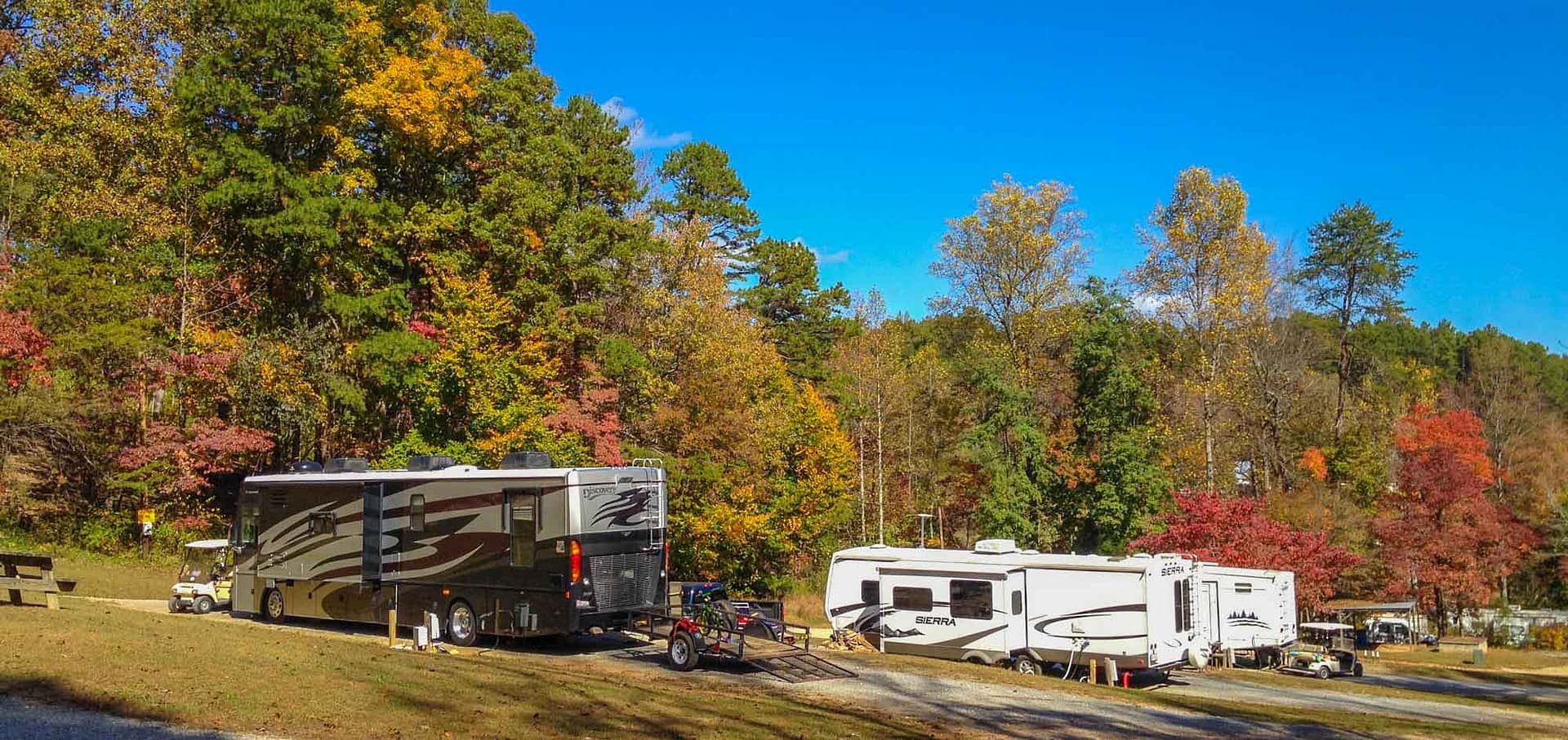 Hidden Creek is a serene RV park nestled in a secluded, wooded area. With spacious skies overhead, guests can enjoy the peacefulness of nature while their RVs are safely parked. The park has recently