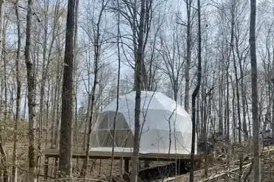 Next week, a white dome opens on top of a hill in the woods at Broad River Campground.