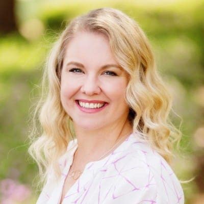 Kristen O'Hara, Director of Sales at RoverPass, a smiling woman in a pink shirt.
