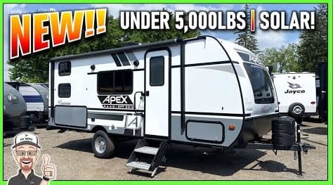 The 2022 Coachmen Apex Nano Off-Grid 186BH is a camper equipped with a solar panel on its side.
