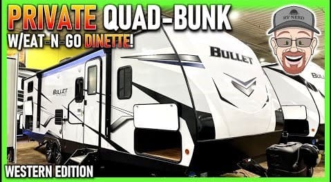 A picture of a private quad bunk travel trailer.