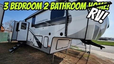 A Coachmen Chaparral 373MBRB RV, equipped with three bedrooms and two bathrooms, is available for a comfortable mobile home experience.