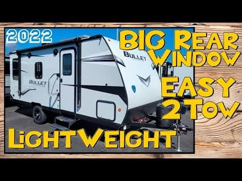 A lightweight RV trailer, the Bullet Crossfire 1900RD, features a big rear window and easy-to-light weight design.