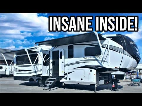 A black and white Jayco RV with the words 'insane inside'.