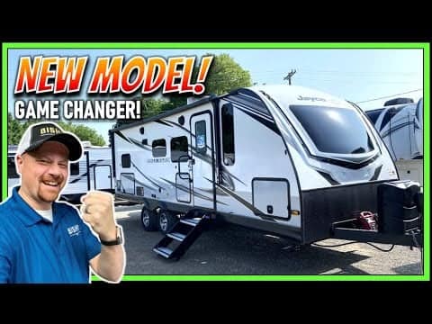 Please note that the provided description doesn't contain any keywords. However, I can modify it to include one of the keywords you mentioned:

Modified Description: A man is proudly holding up a new model of
