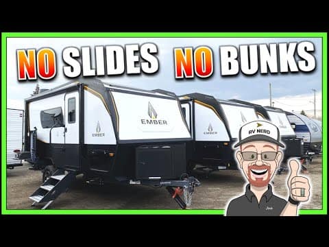 Josh standing next to a 2022 Jay Feather RV, which has a sign indicating "No Slides, No Bunks.