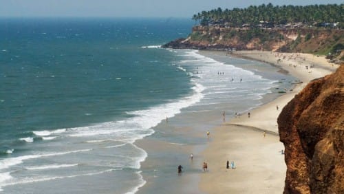 A breathtaking Kerala beach on a cliff, perfect for Caravan Tourism.