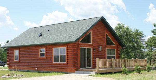 Pine View Campground officially made available small log cabins with green roofs.