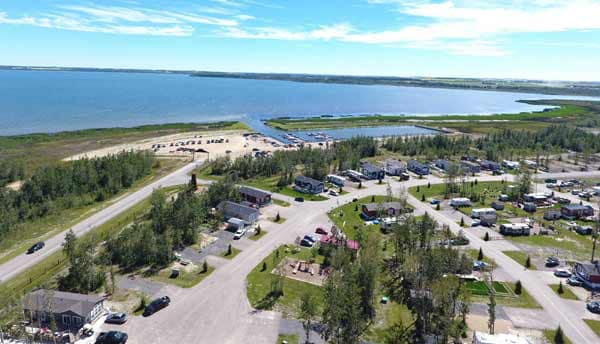 An aerial view of the Sandy Point Resort RV Park expansion near the water.