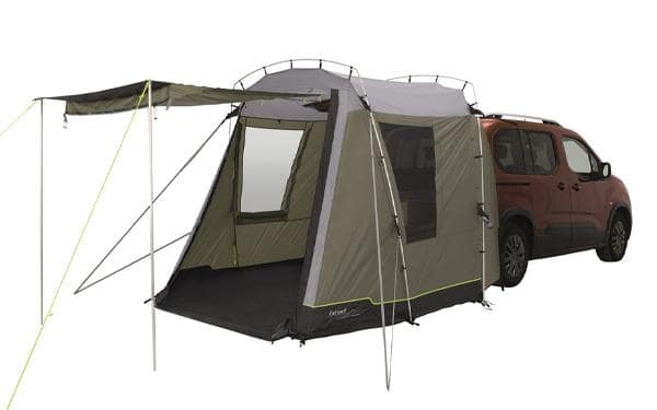 An Outwell van with a Drive-Away Awning attached to it, perfect for Outdoor Adventurers.