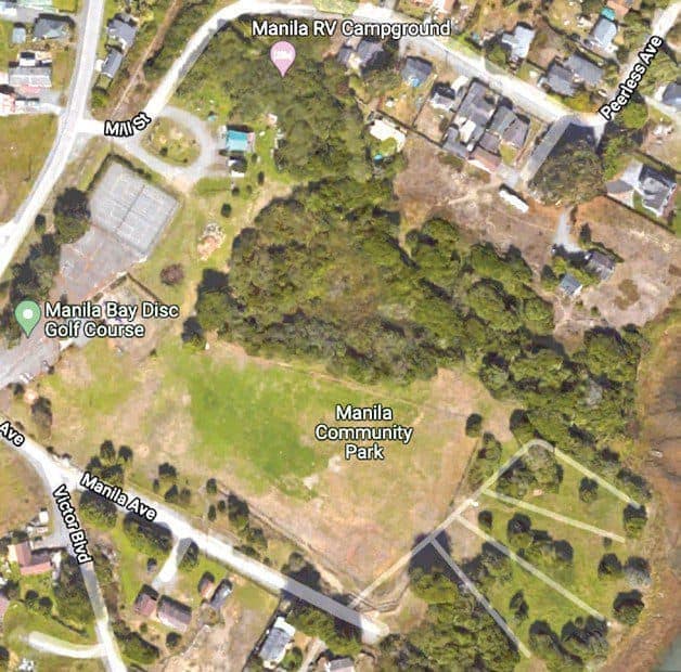 An aerial view of a California campground with a lot of trees and grass.