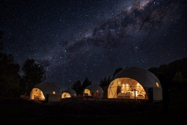 An Eco-Dome Glampsite nestled under the breathtaking Milky Way in New Zealand.