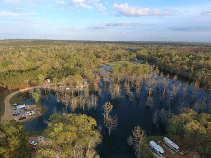 An aerial view of an RV park in the woods, also known as Paradise Ranch.