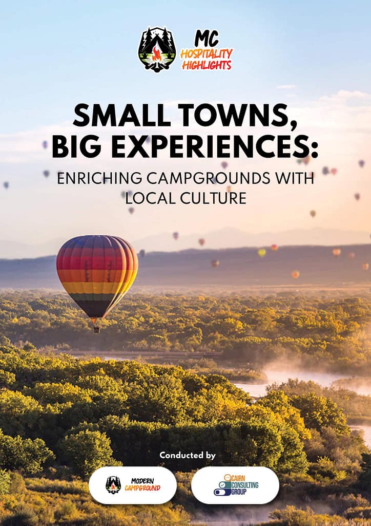 A hot air balloon floats over a scenic landscape at sunset. Text: "Small Towns, Big Experiences: Enriching Campgrounds with Local Culture" by Modern Campground and Cairn Consulting Group.