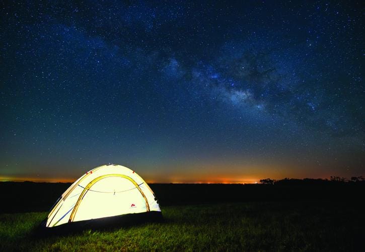 A Timberline Glamping tent expands under a starry sky at Kissimmee Prairie.