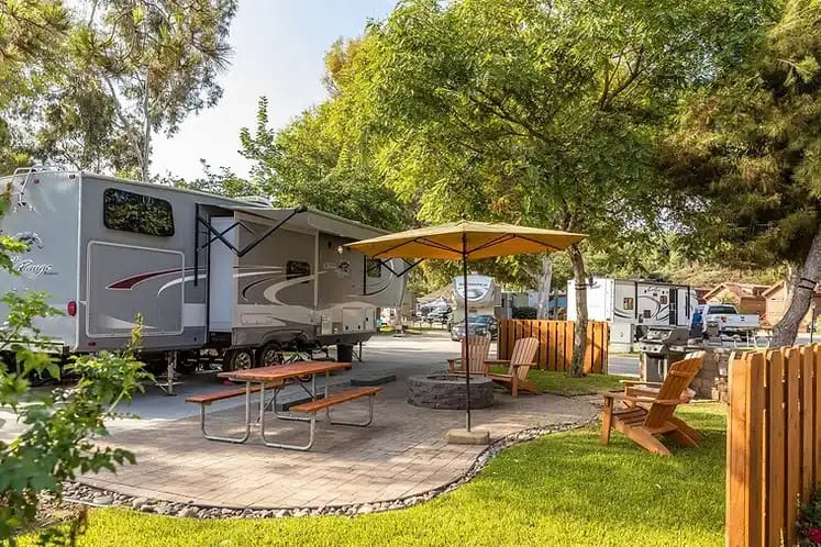 A Union Township RV Park with a picnic table and chairs.