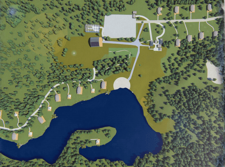 A map showing the location of a lake in a forest within Mountain View County.