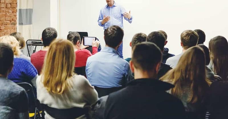 A man from the RV Technical Institute giving a presentation to an audience in January.