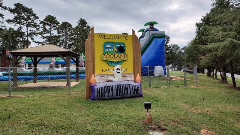 A sign in front of Zooland, a water park under new ownership, now also serving as a family campground.