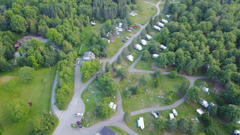 An aerial view of Pleasant Hill Campground, nestled in a forest.