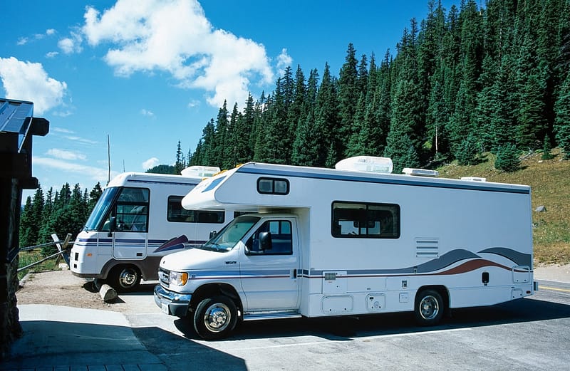 Two caravan parked next to each other.