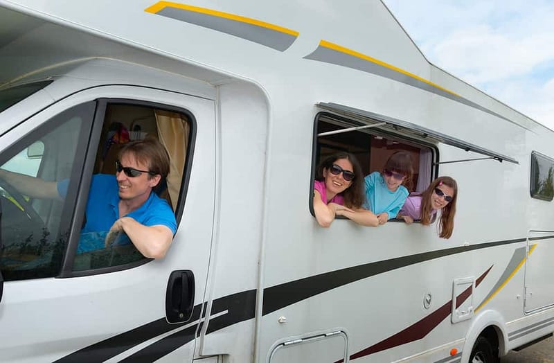 Members of Escapees RV Club gathered in Tennessee, eagerly peering out the window of an RV during the 61st Escapade.
