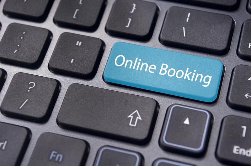 A blue button with the word online reservations on it.
