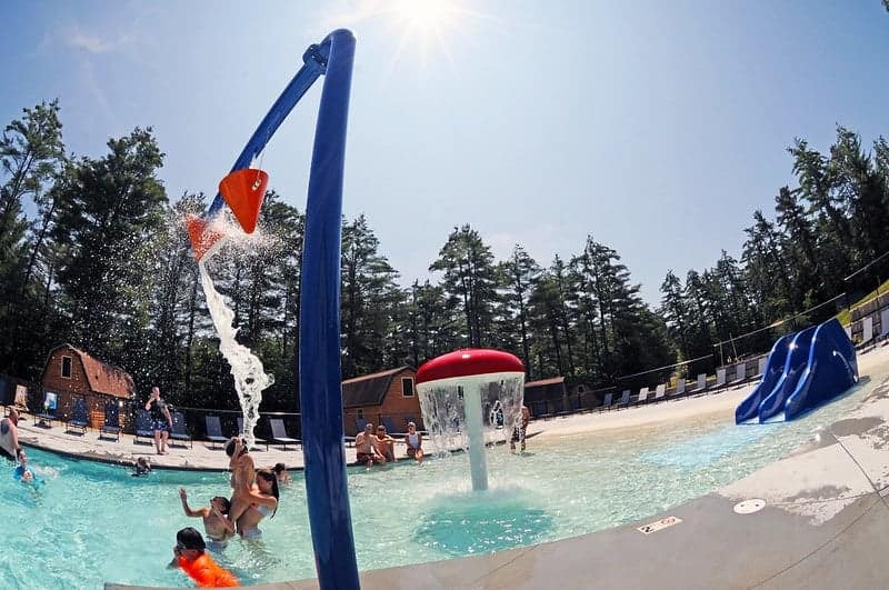 A group of kids enjoying water park activities.