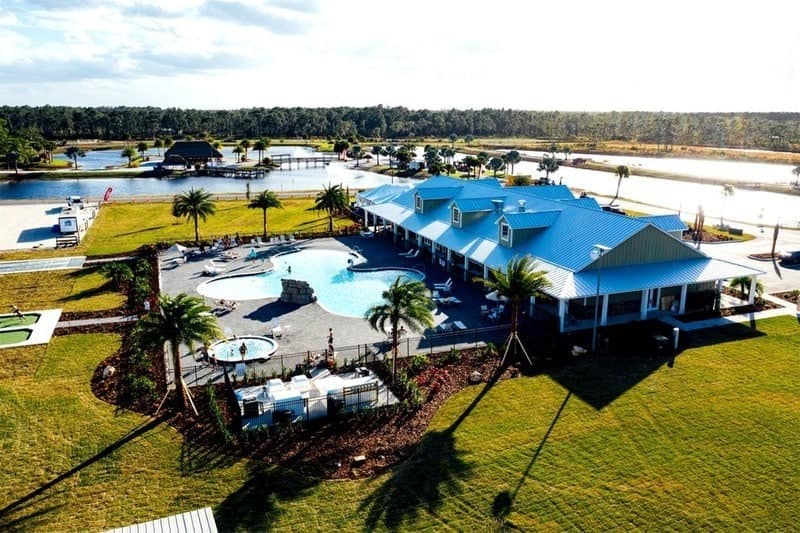 "Experience the ultimate relaxation with Sunlight Resorts' breathtaking aerial view of a resort featuring a luxurious swimming pool. Book now and take advantage of our exclusive Cyber Monday promotion, available only until the