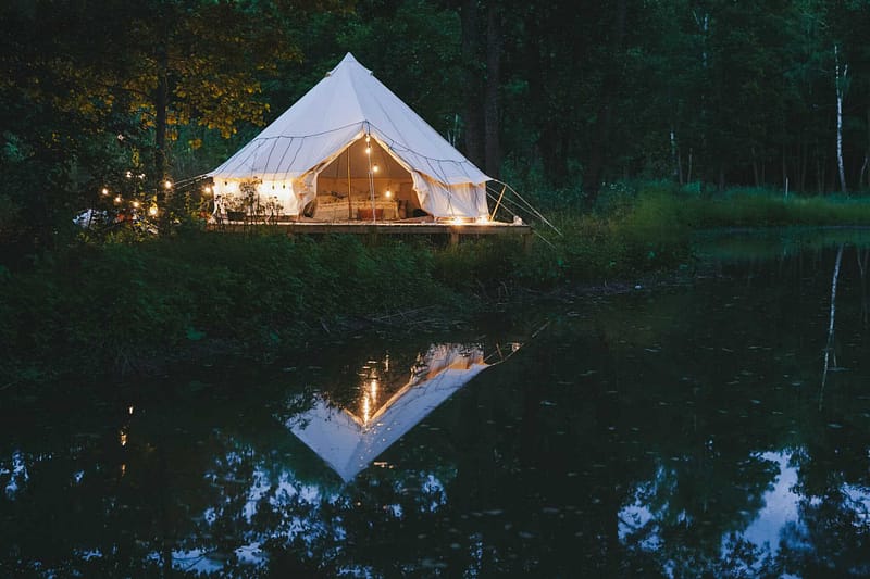 Adding a Sebasco Harbor Resort tent for glamping by a lake in the woods.