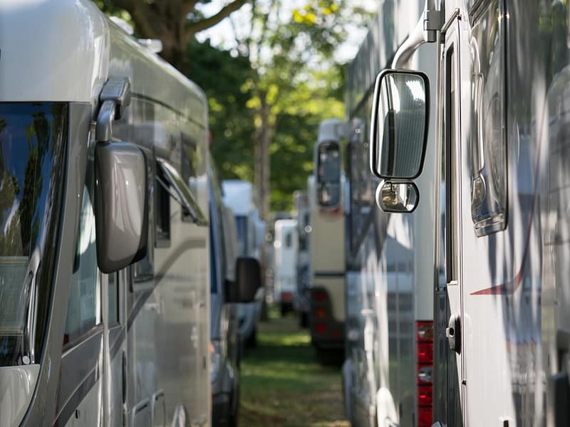 A group of rvs parked next to each other at an Organizational Excellence Workshop organized by Founder at Airstream Adventures Northwest.