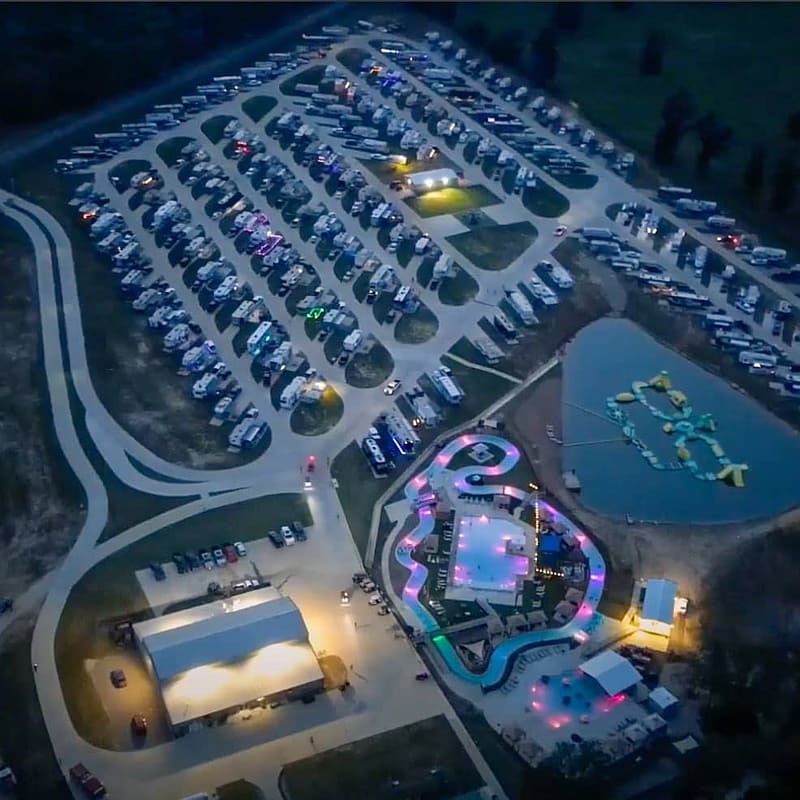An acquisition expands Stillwater RV Resort at night.