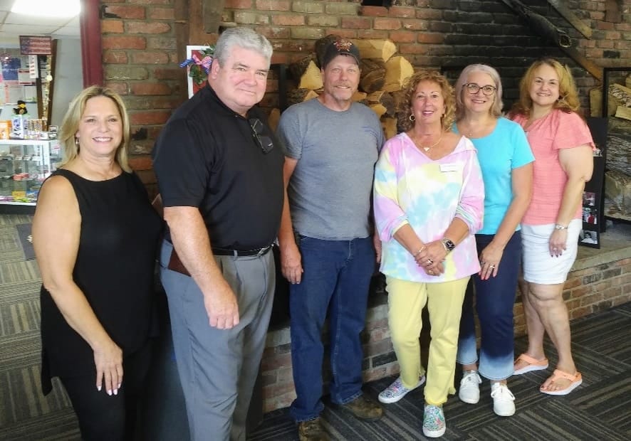 Highlights of NJCOA's Fall Tour include a group of people standing in front of a fireplace. Key Takeaways from the tour also feature this memorable moment.