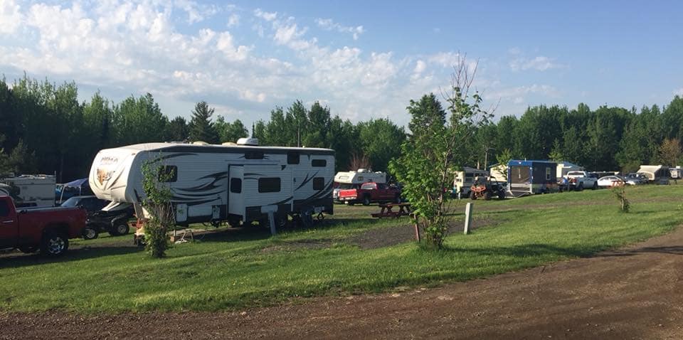 A group of RVs parked at an RV park in Minnesota.