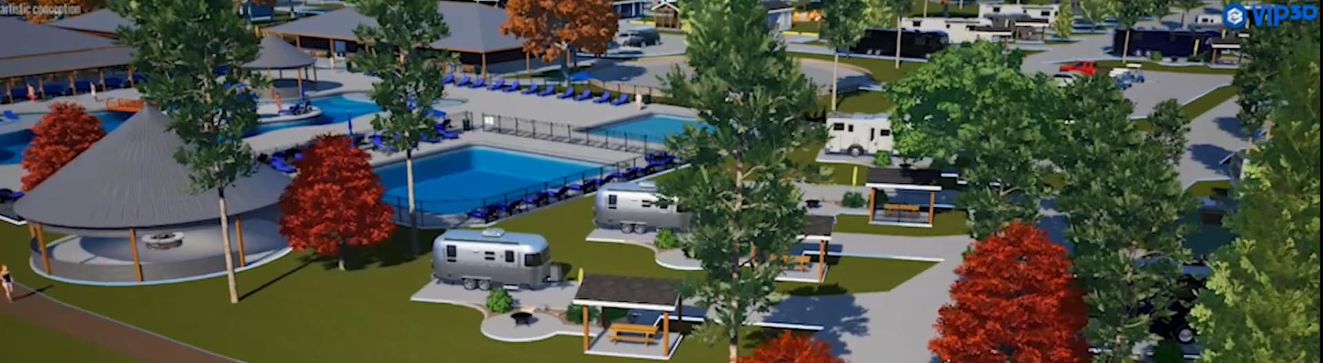 Aerial view of a vibrant campground with RVs, a pool, and a pavilion. Colorful trees dot the landscape, and lounge chairs surround the pool. Multiple trailers are parked with a few shelters nearby, indicating a lively outdoor setting.
